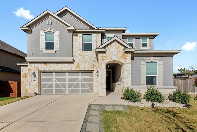 view of front facade with a front lawn and a garage