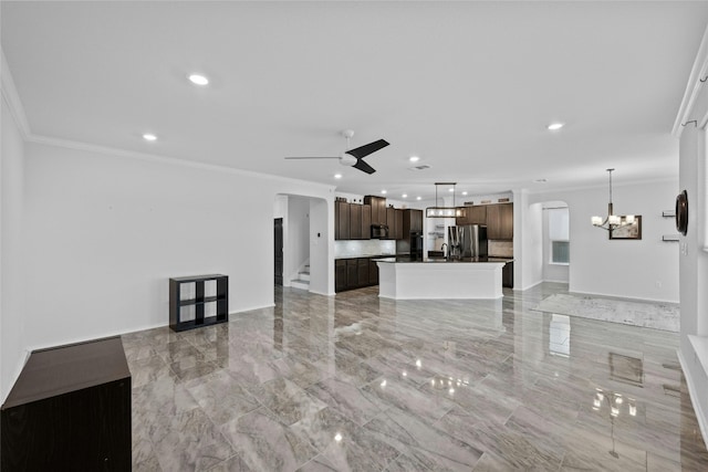 living room featuring ornamental molding and ceiling fan with notable chandelier