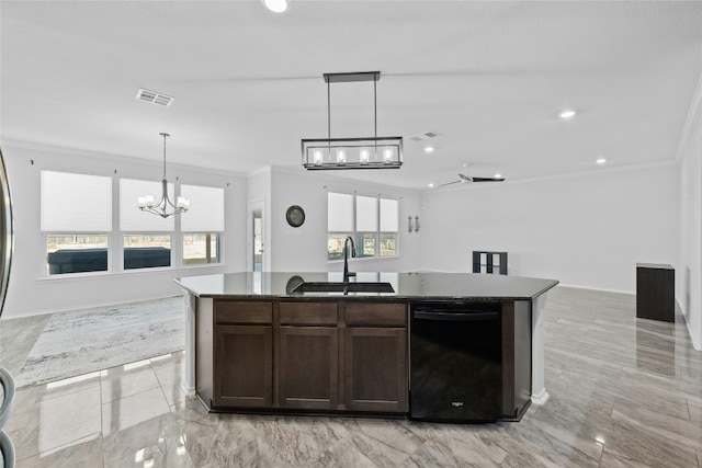 kitchen with sink, dishwasher, plenty of natural light, and a center island with sink