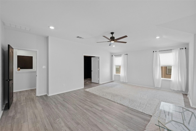 unfurnished room with light hardwood / wood-style flooring and ceiling fan