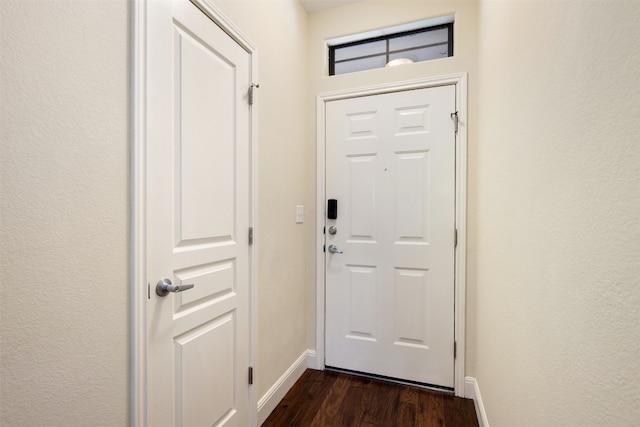 doorway to outside with dark hardwood / wood-style flooring