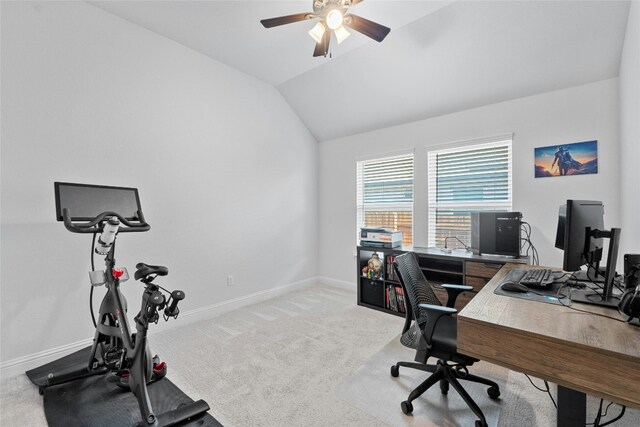 home office with carpet flooring and vaulted ceiling