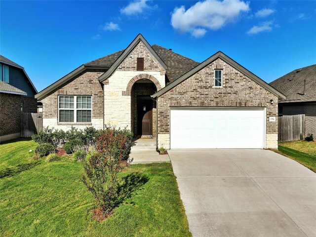 view of front of home with a front lawn