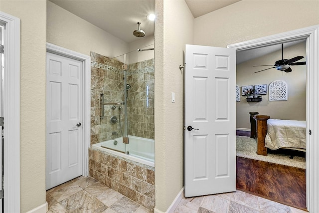 bathroom featuring tiled shower / bath and ceiling fan