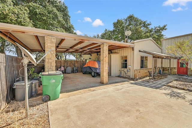 view of parking / parking lot with a carport