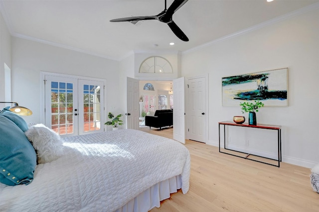 bedroom with ceiling fan, access to outside, crown molding, light hardwood / wood-style floors, and french doors