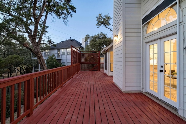 wooden deck featuring french doors