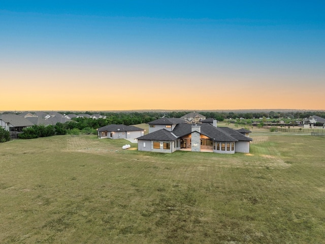 view of front of house with a lawn