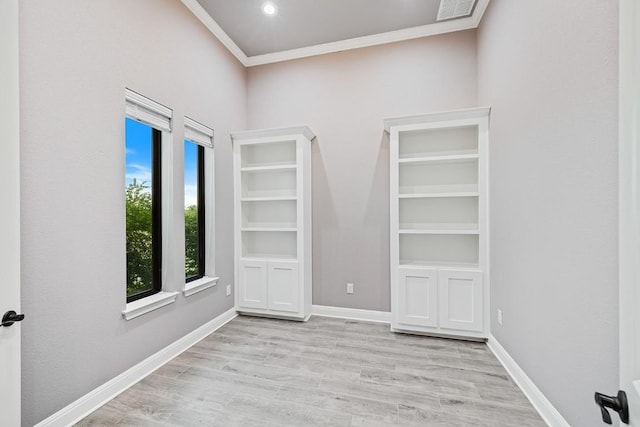 124 Park Place Dr, Georgetown, TX 78628 - unfurnished room with ornamental molding and wood finished floors