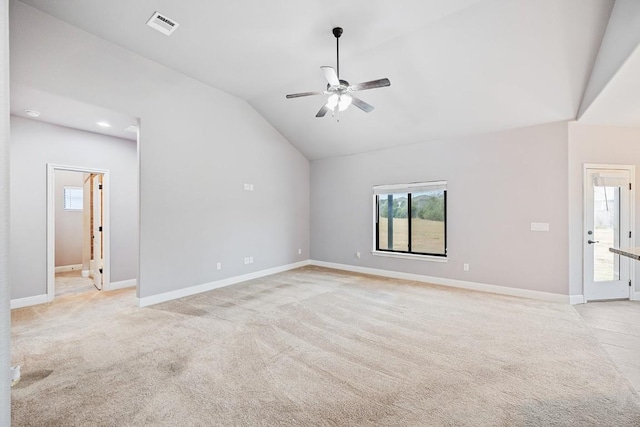124 Park Place Dr, Georgetown, TX 78628 - spare room featuring light colored carpet, lofted ceiling, ceiling fan, and healthy amount of natural light