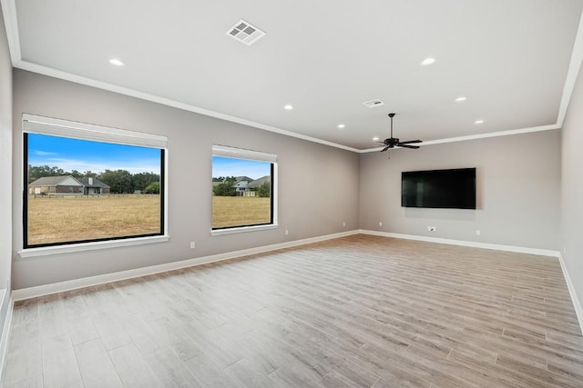 124 Park Place Dr, Georgetown, TX 78628 - unfurnished room featuring a ceiling fan, ornamental molding, light wood finished floors, and recessed lighting
