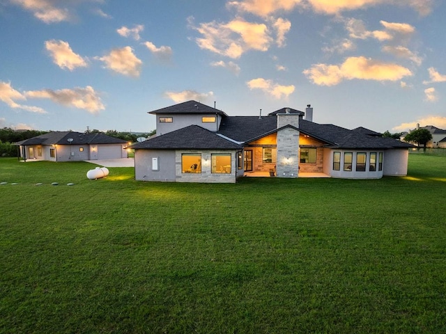 124 Park Place Dr, Georgetown, TX 78628 - back of house with a yard and a chimney