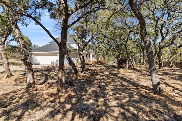 view of yard with a garage