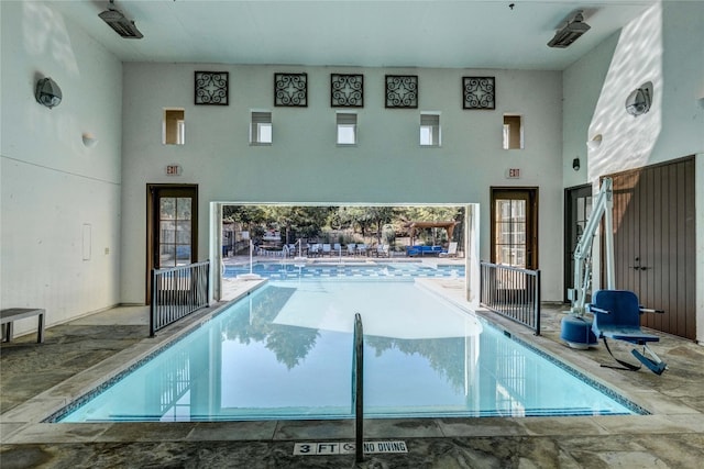 view of swimming pool with a patio area