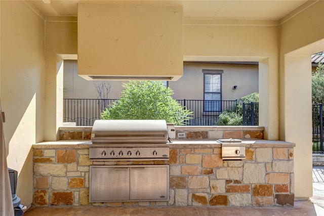 view of patio / terrace featuring an outdoor kitchen and grilling area