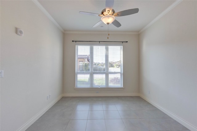 tiled empty room featuring ornamental molding and ceiling fan