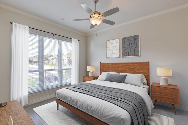 bedroom featuring ceiling fan, ornamental molding, multiple windows, and light tile patterned floors