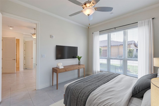 tiled bedroom featuring ceiling fan and ornamental molding