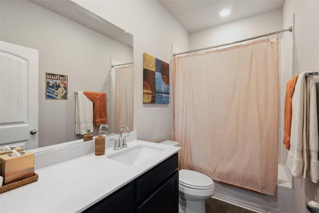 full bathroom with shower / bath combination with curtain, vanity, and toilet