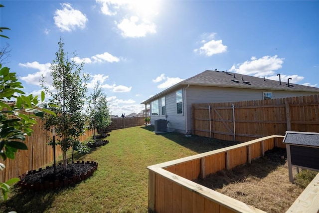 view of yard featuring central AC