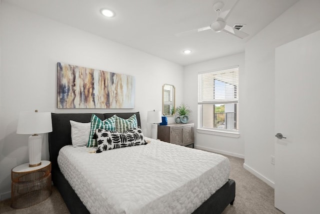 carpeted bedroom with ceiling fan