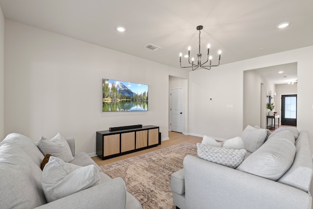 living room featuring a chandelier