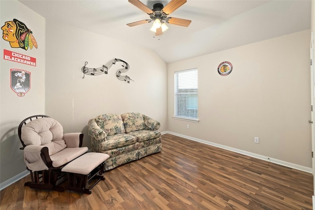 living area with lofted ceiling, dark hardwood / wood-style floors, and ceiling fan