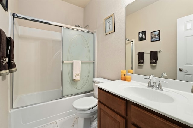 full bathroom featuring toilet, enclosed tub / shower combo, and vanity