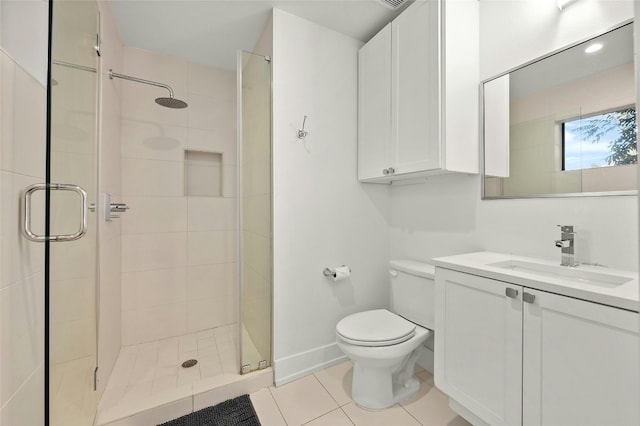 full bath featuring a stall shower, toilet, tile patterned floors, and baseboards