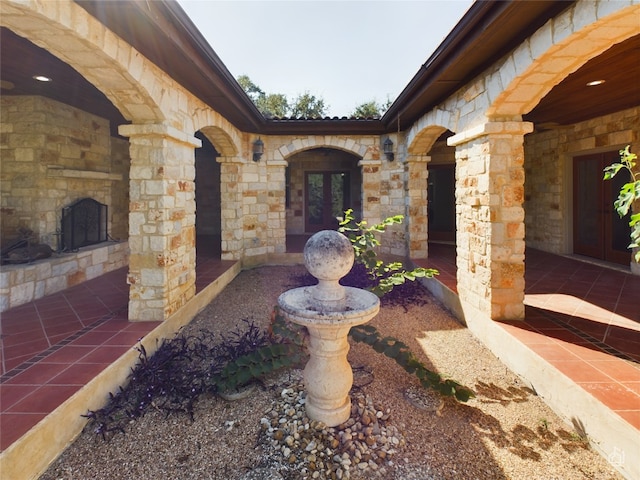 entrance to property with a patio area