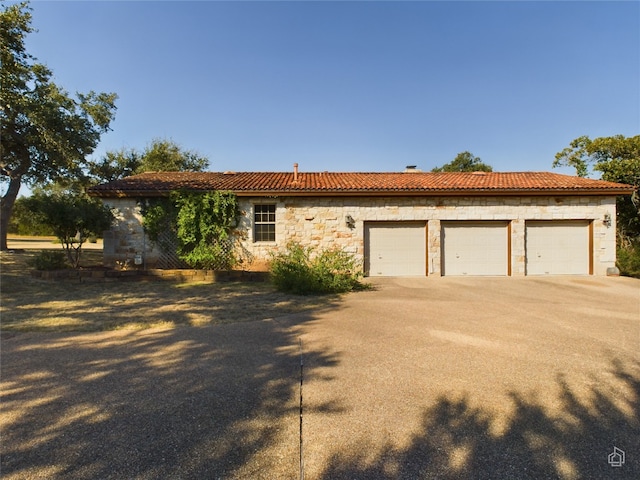 view of property exterior featuring a garage