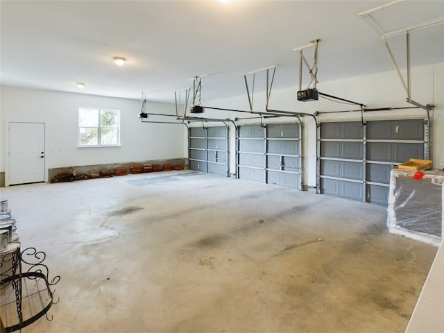 garage featuring a garage door opener