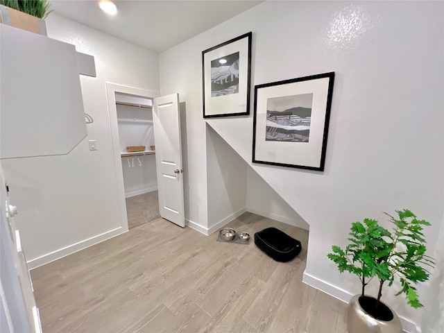 hallway featuring light hardwood / wood-style floors