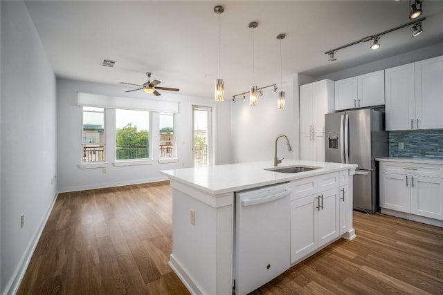 1900 Barton Springs Rd Unit 5042, Austin, TX 78704 - kitchen with dishwasher, stainless steel fridge, dark wood-style flooring, and ceiling fan