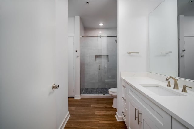 1900 Barton Springs Rd Unit 5042, Austin, TX 78704 - full bath featuring vanity, a shower stall, wood finished floors, and recessed lighting