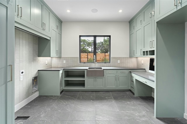 kitchen with tasteful backsplash and sink