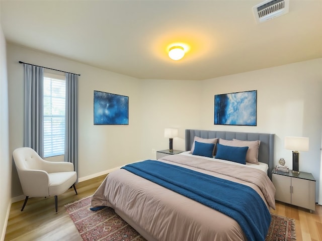 bedroom featuring light wood-type flooring