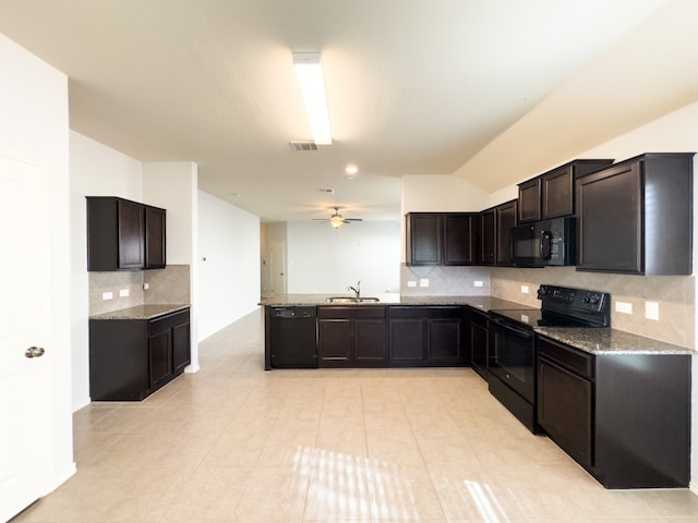 kitchen featuring decorative backsplash, stone countertops, sink, black appliances, and ceiling fan