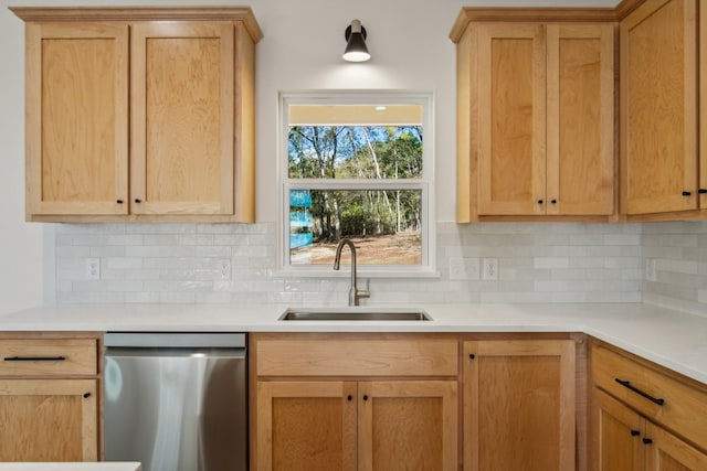 kitchen featuring sink, tasteful backsplash, dishwasher, and light brown cabinets