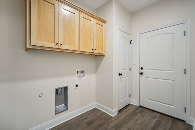 clothes washing area with hookup for an electric dryer, dark hardwood / wood-style flooring, gas dryer hookup, washer hookup, and cabinets