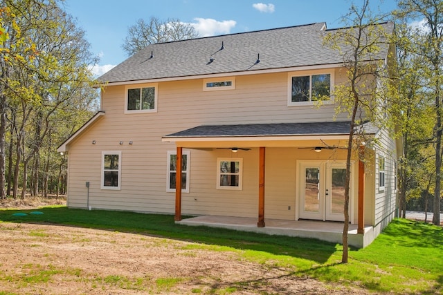 rear view of house with a yard, a patio, and ceiling fan