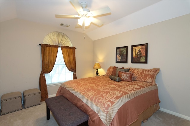 bedroom with light carpet, lofted ceiling, and ceiling fan