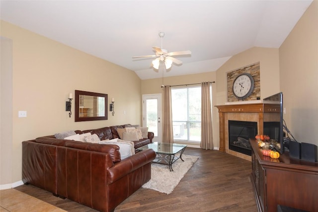 506 Fern Ct, Cedar Park, TX 78613 - living area featuring lofted ceiling, a ceiling fan, a tile fireplace, and wood finished floors