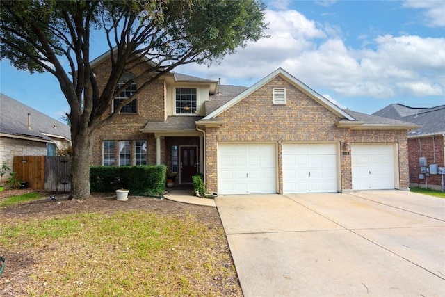 506 Fern Ct, Cedar Park, TX 78613 - traditional home featuring an attached garage, brick siding, driveway, and a shingled roof