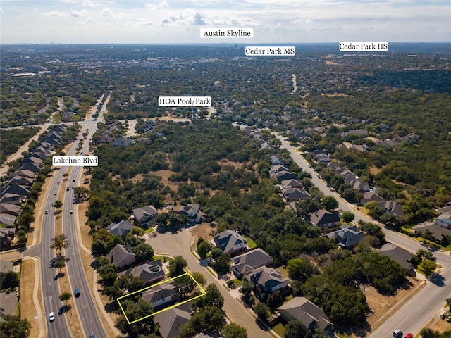 506 Fern Ct, Cedar Park, TX 78613 - aerial perspective of suburban area with property parcel outlined and a highway