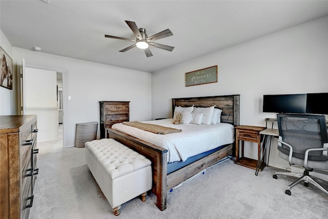 bedroom with light colored carpet and ceiling fan