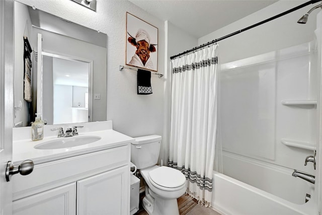 full bathroom featuring vanity, toilet, and shower / tub combo with curtain