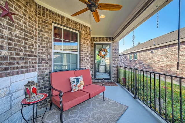 balcony featuring ceiling fan