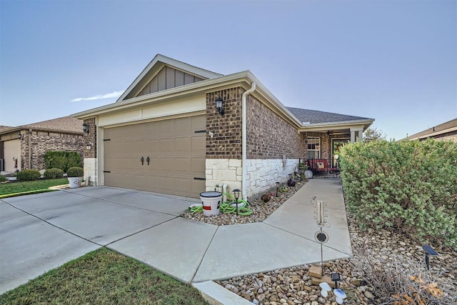 ranch-style home featuring a garage