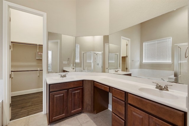 bathroom with vanity, hardwood / wood-style floors, and a shower with shower door